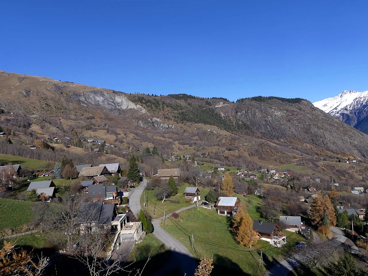 Sight, in autumn from Saint-Roch chapel, of some hamlets of Jarrier territory, in Savoie , France .